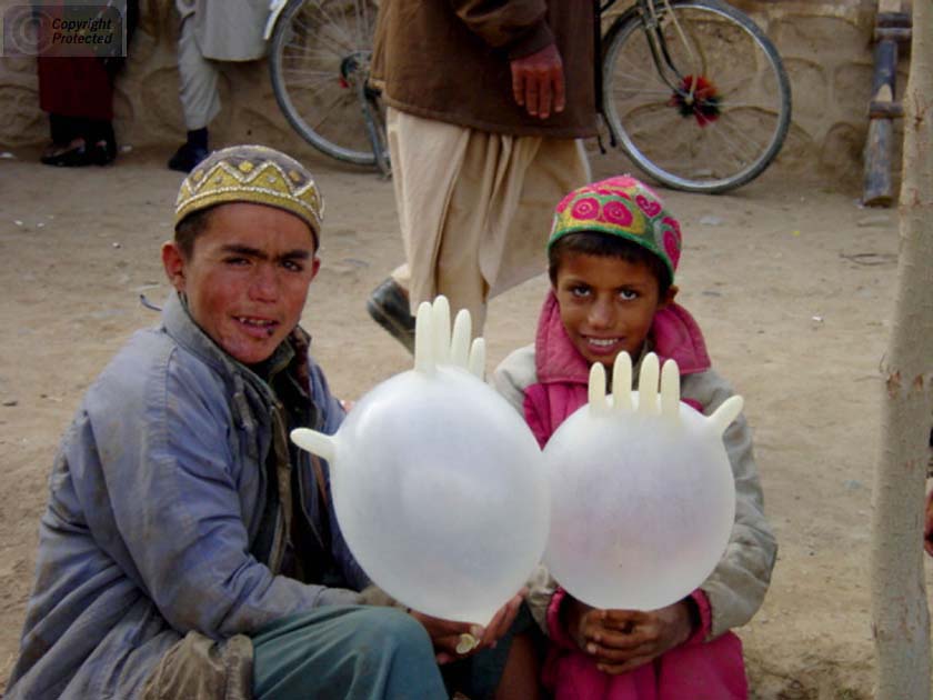 Two Boys with Glove Balloons